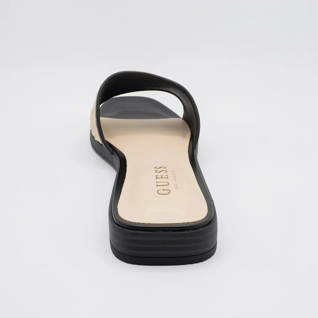 Guess Sandalia Slip On Negro Triángulo Guess Dorado Empeine Suela Negra | Compralo en Soy Reinventada GT | 4