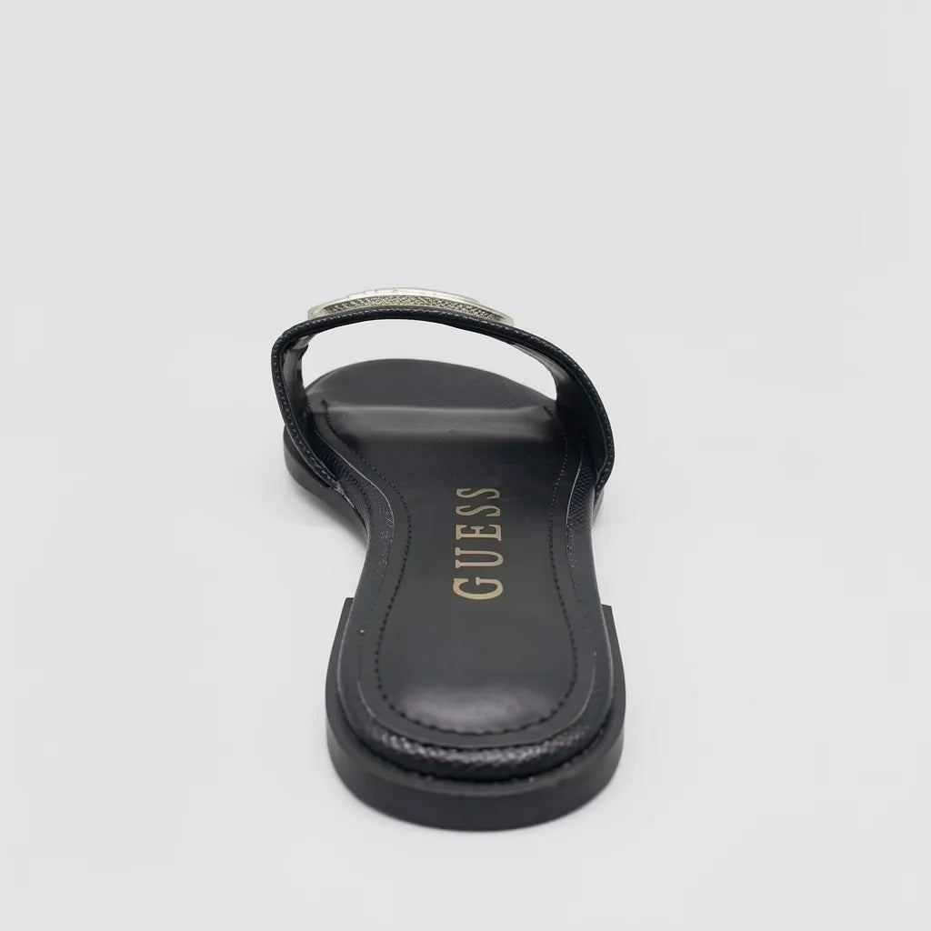 Guess Sandalia Slip On Negro Placa Dorado Empeine Suela Negra | Photo Studio AI | 4