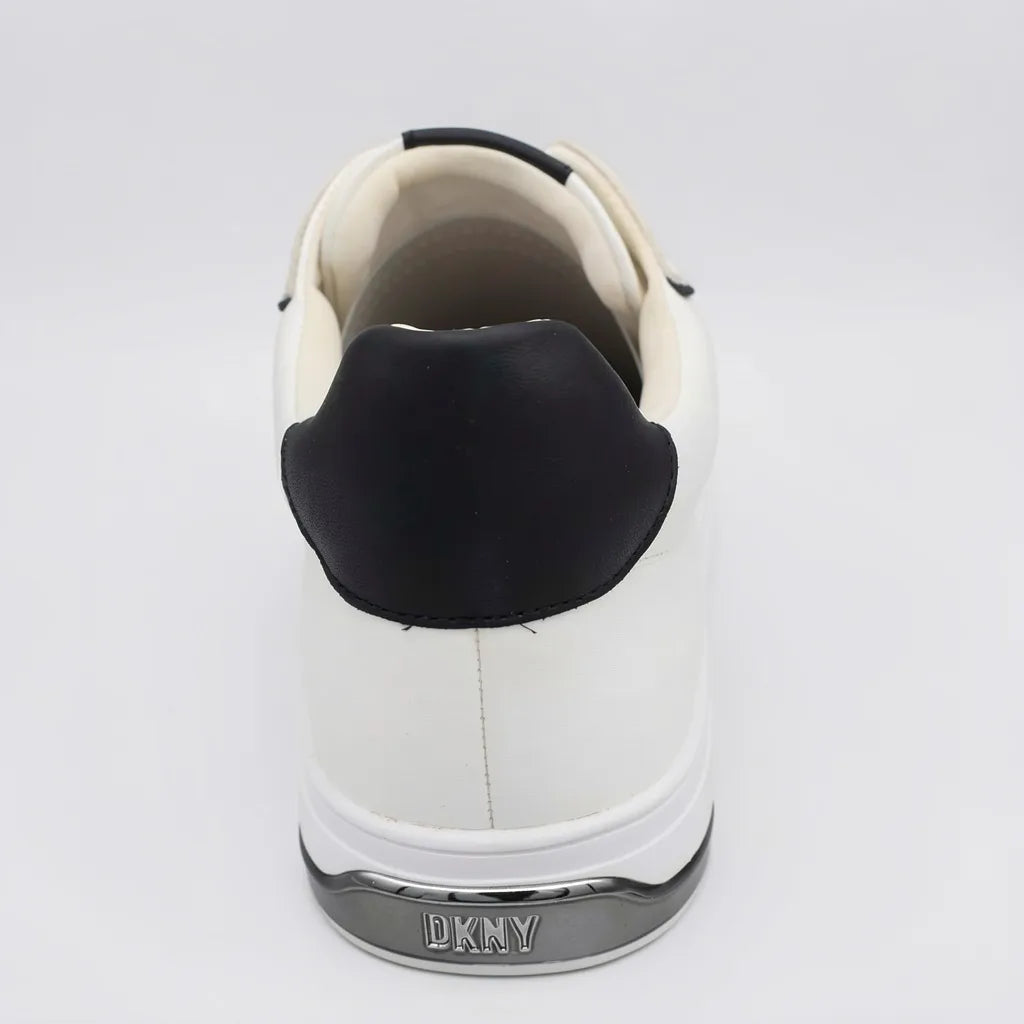 DKNY Tenis Minimal Blanco hueso Detalles Negro Lateral, Lengüeta y talón Suela Blanca | Photo Studio AI | 1